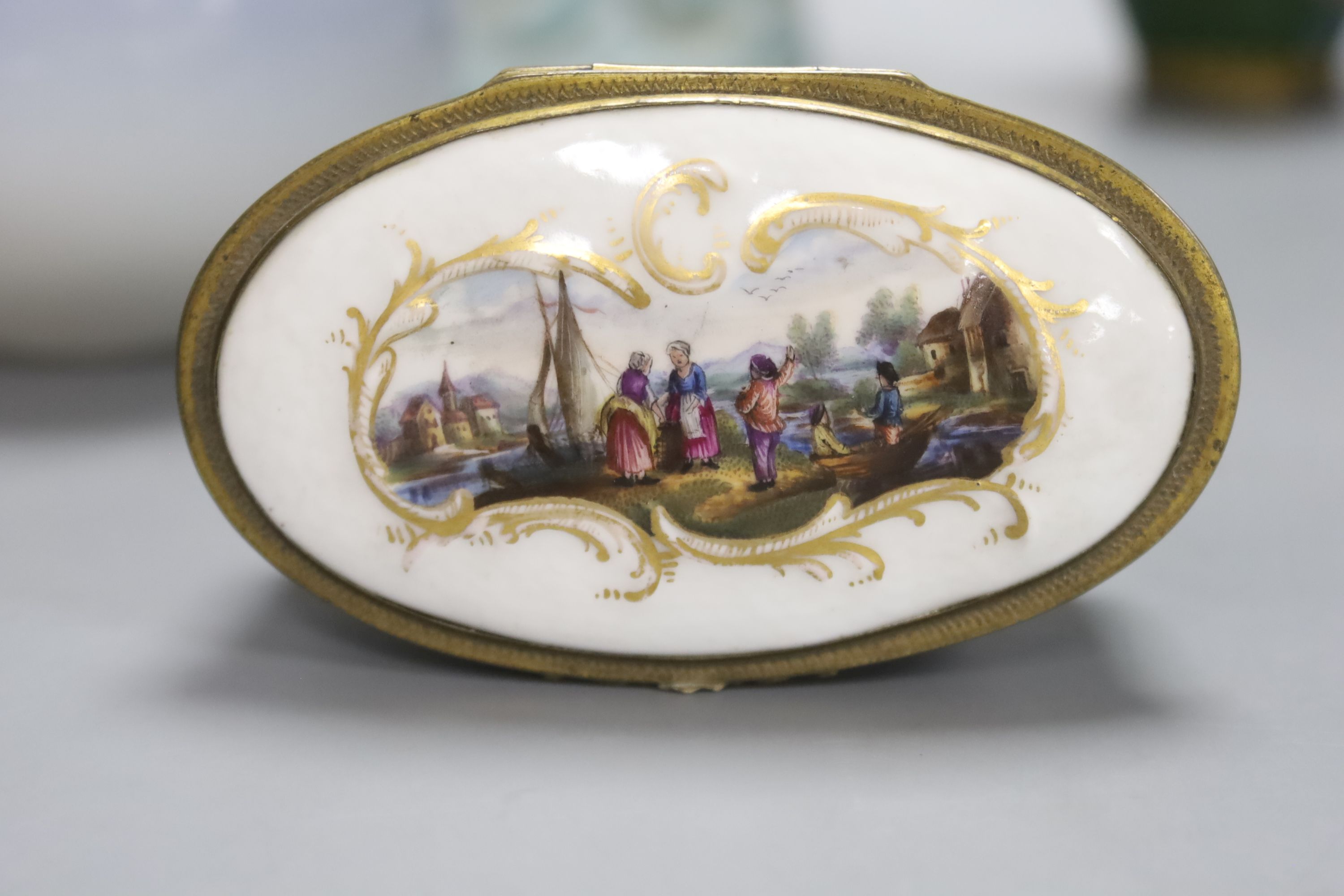 A Meissen style porcelain trinket box, a Royal Copenhagen vase, 9cm high, a cherub vase, 25cm high, and a pair of Chinese cloisonne enamel vases, 13cm high